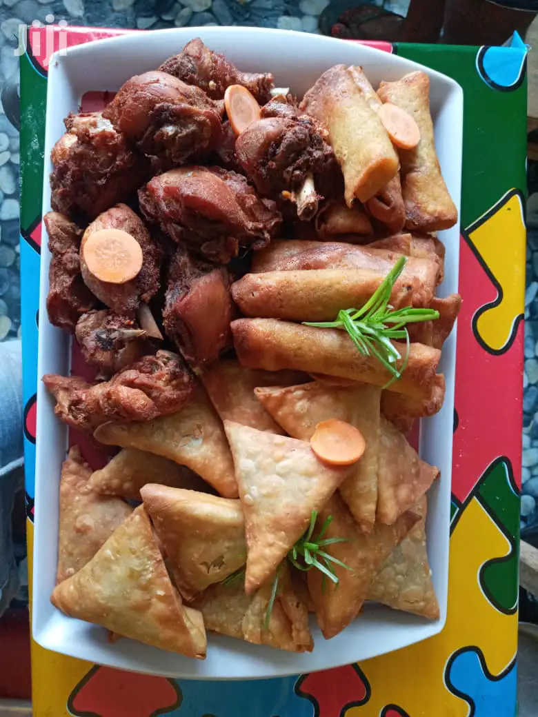 Cakes, Samosa, Spring Rolls,Yam Balls, Fried Chicken And Mor
