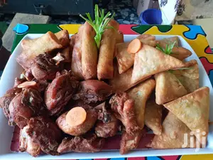 Cakes, Samosa, Spring Rolls,Yam Balls, Fried Chicken And Mor