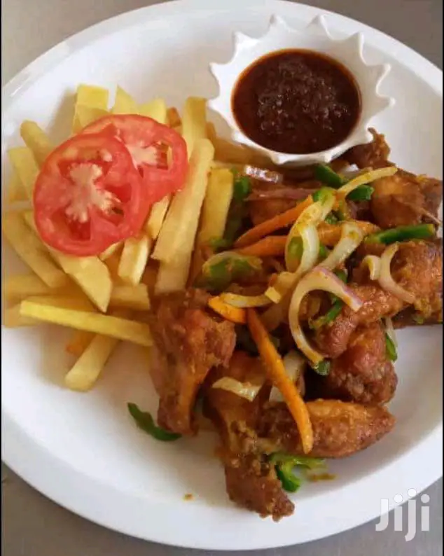 Rice and Chicken,Fish,Pork,Beefand Goat With Yam,Banku,More