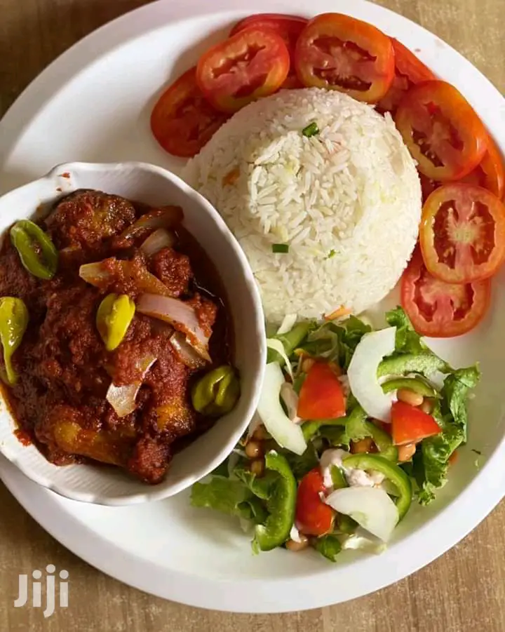 Rice and Chicken,Fish,Pork,Beefand Goat With Yam,Banku,More