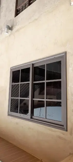 Gray Powdered Divisions Sliding Windows With Dark Glass
