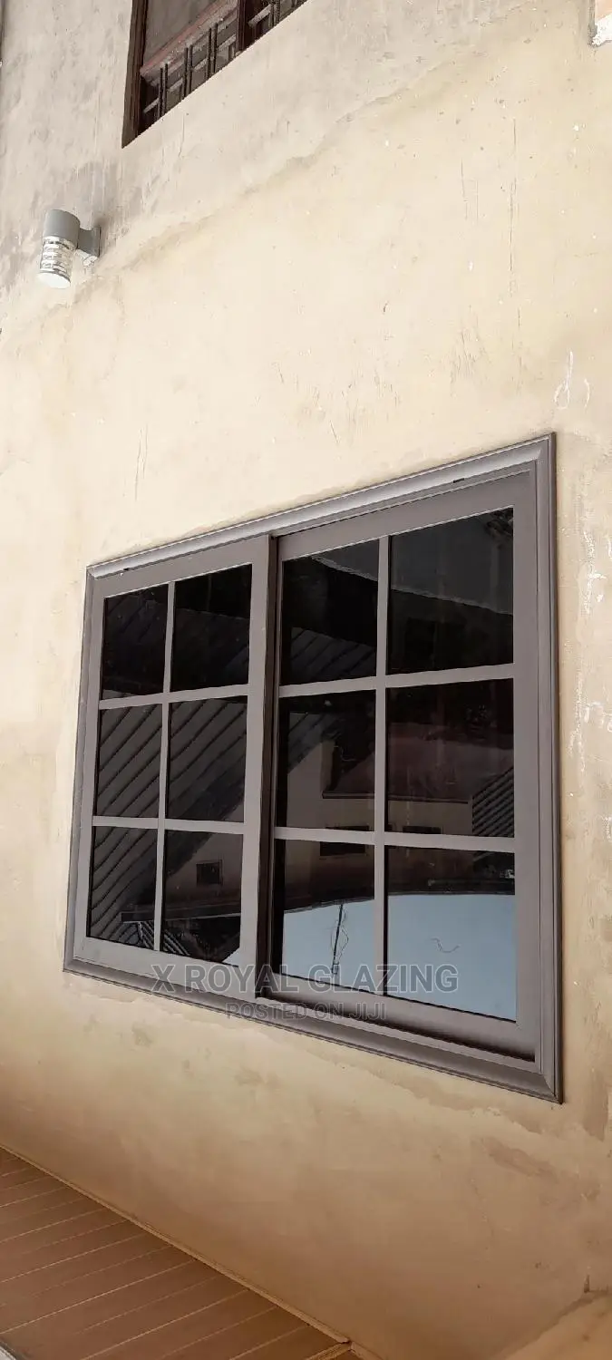 Gray Powdered Divisions Sliding Windows With Dark Glass