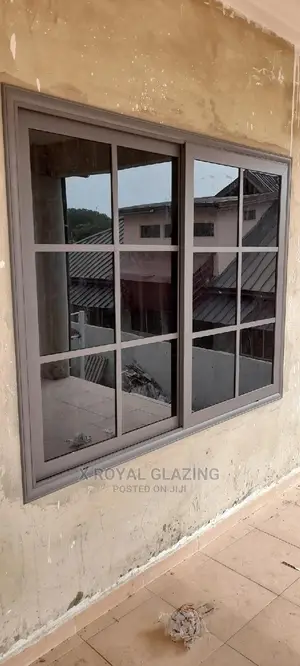 Gray Powdered Divisions Sliding Windows With Dark Glass