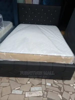 Queensize Leather Bed With Matress . Free Delivery