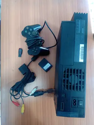 Sony Ps2 Game Console + Games