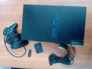 Sony Ps2 Game Console + Games