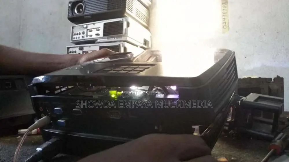 Projector Repairs Lamp & Lens Fixing  Accessories Sales Rentals