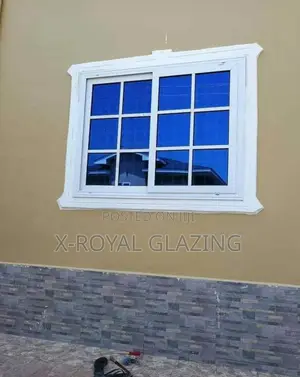 White Divisions With Blue Glass Sliding Windows