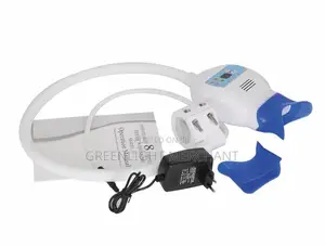 Teeth Whitening Light and Dental Instruments