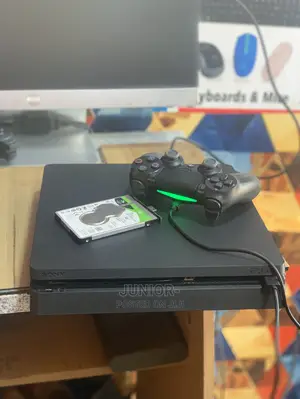 Neat Playstation 4 Slim With Games