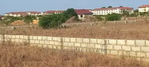 One Plot of Land Fenced at Millennium Cty Centre- Pentecost