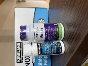 Kirkland Minoxidil Liquid + Natrol Biotin (100 Tabs ) Combo