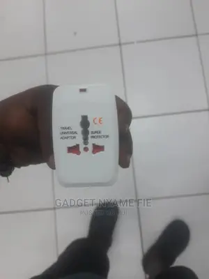Universal (Eu/ Us/ Uk/ Au )Travel Ac Power Adaptor (100-250 Volts)