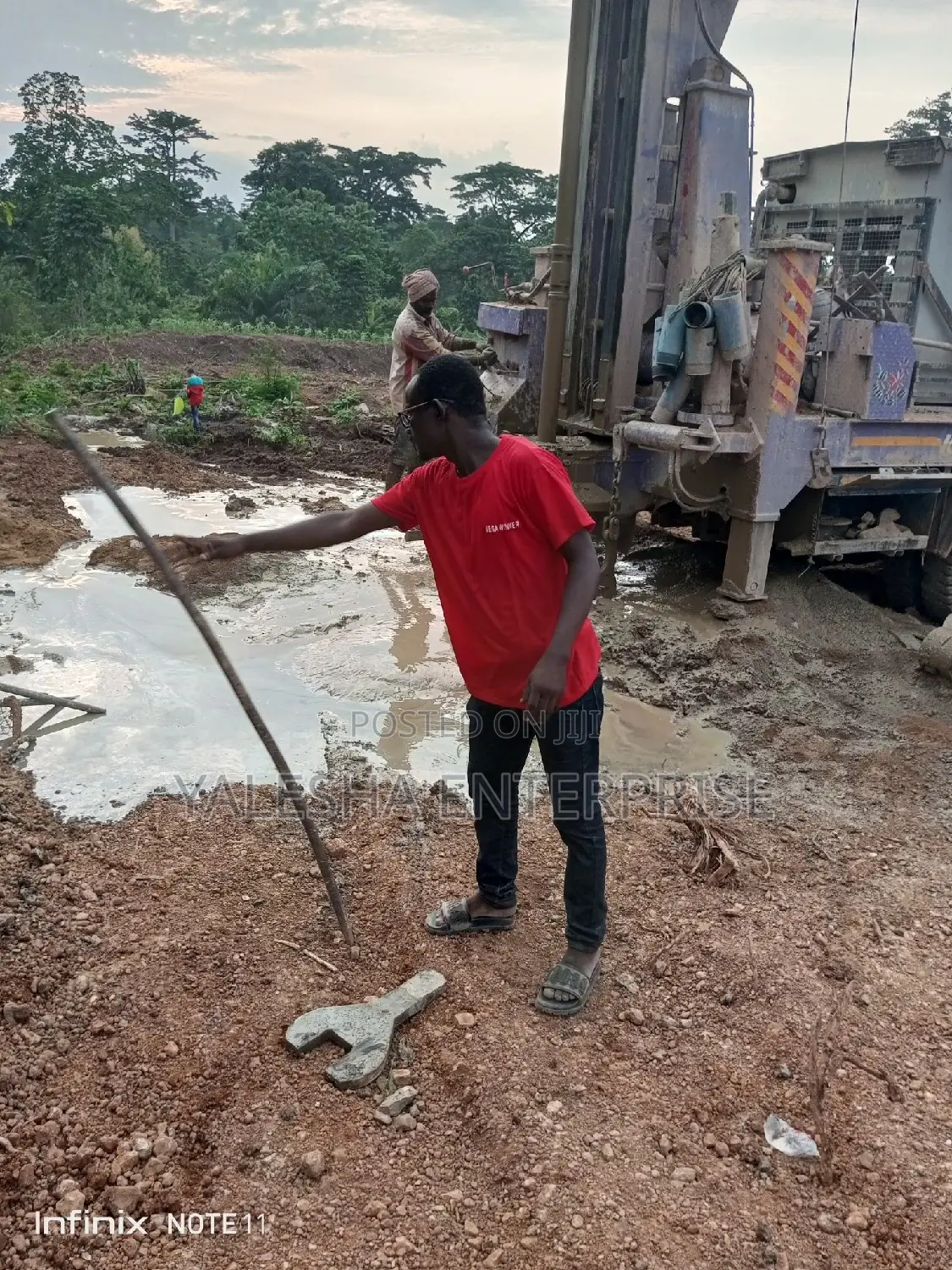 Borehole Drilling Services With Quality Pump and Blue Pipes