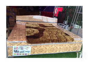 Kings-Size Bed Frame With an Inbuilt Mattress