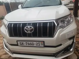 Car for Rent. Land-Cruisers Prado White for Rent in Ghana
