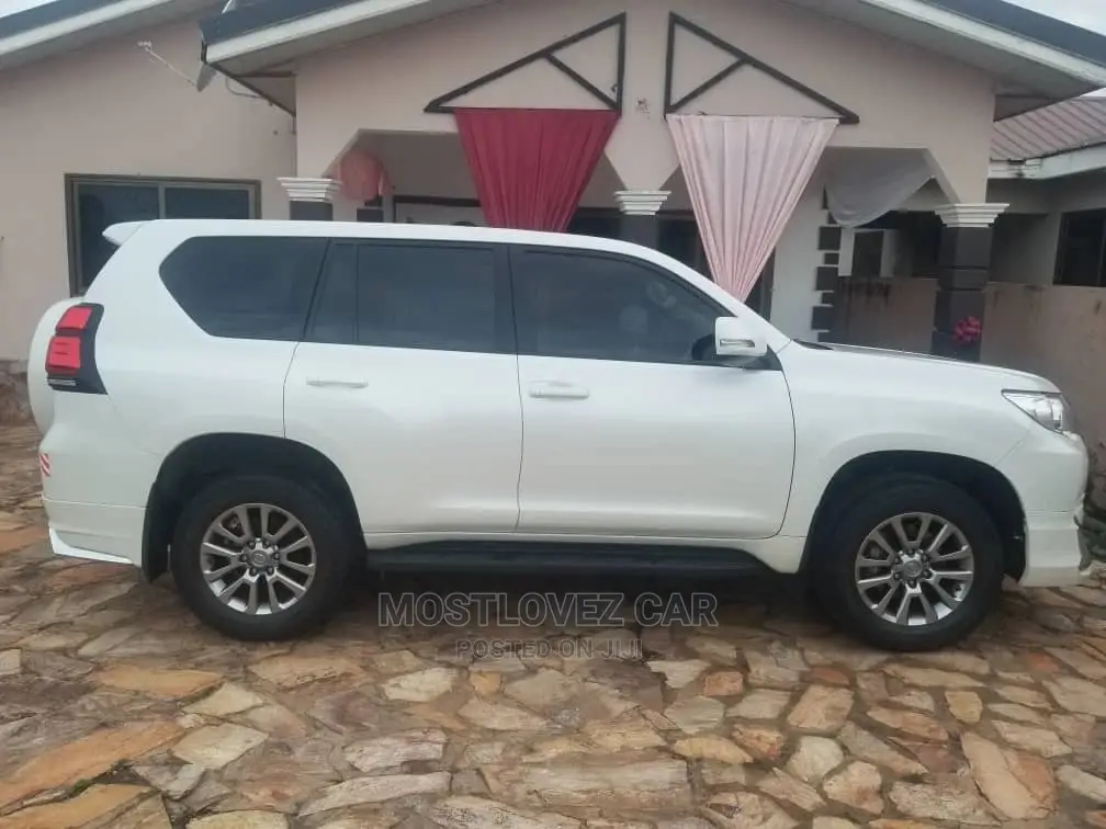 Car for Rent. Land-Cruisers Prado White for Rent in Ghana