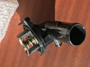 Photo - Jeep Wrangler.6L Thermostat .