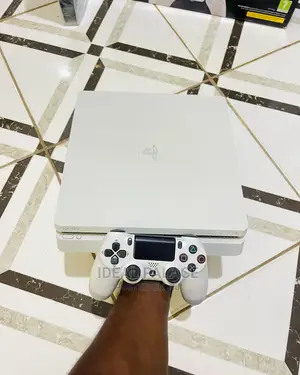 Limited White PS4 Slim With Games