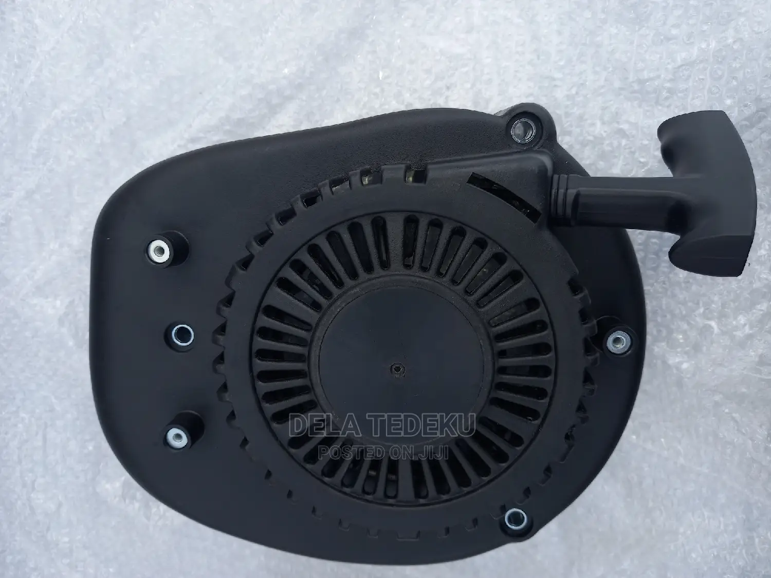 Lawn Mower Engine Starter/ at Caprice Bus Stop