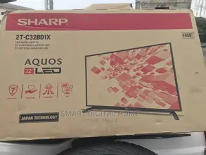Photo - Slim 32” Digital Satellite Sharp Tv Plus Free Tv Guard