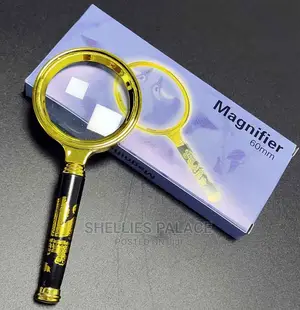 Photo - Portable Handheld Magnifying Glass