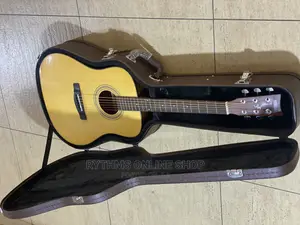 Yamaha Acoustic Guitar With Solid Leathercase