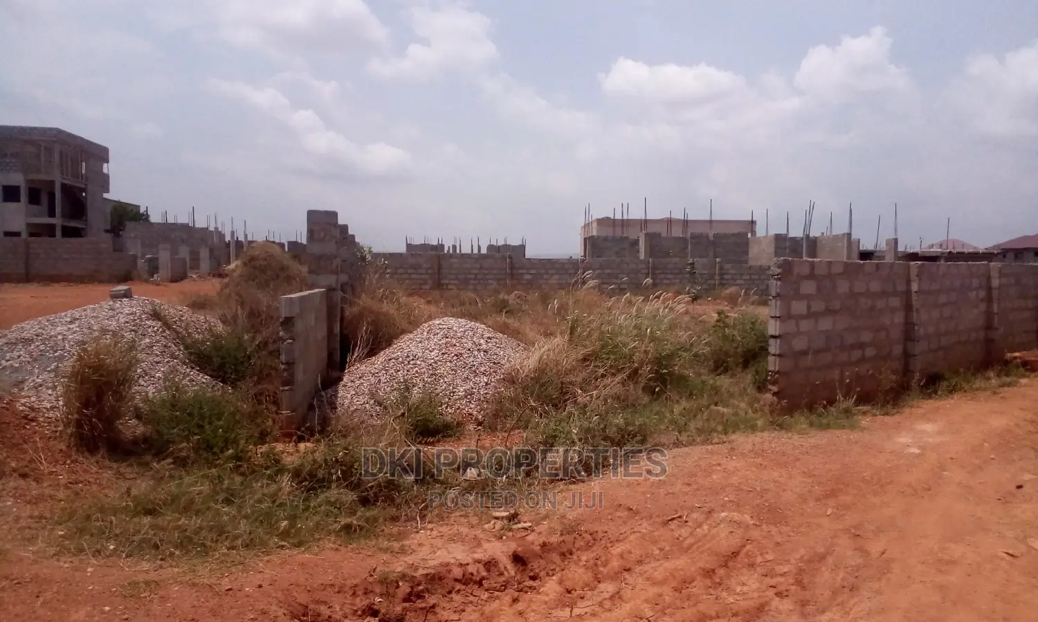 A Titled Plot of Land for Sale.