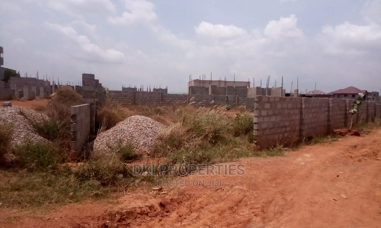 A Titled Plot of Land for Sale.