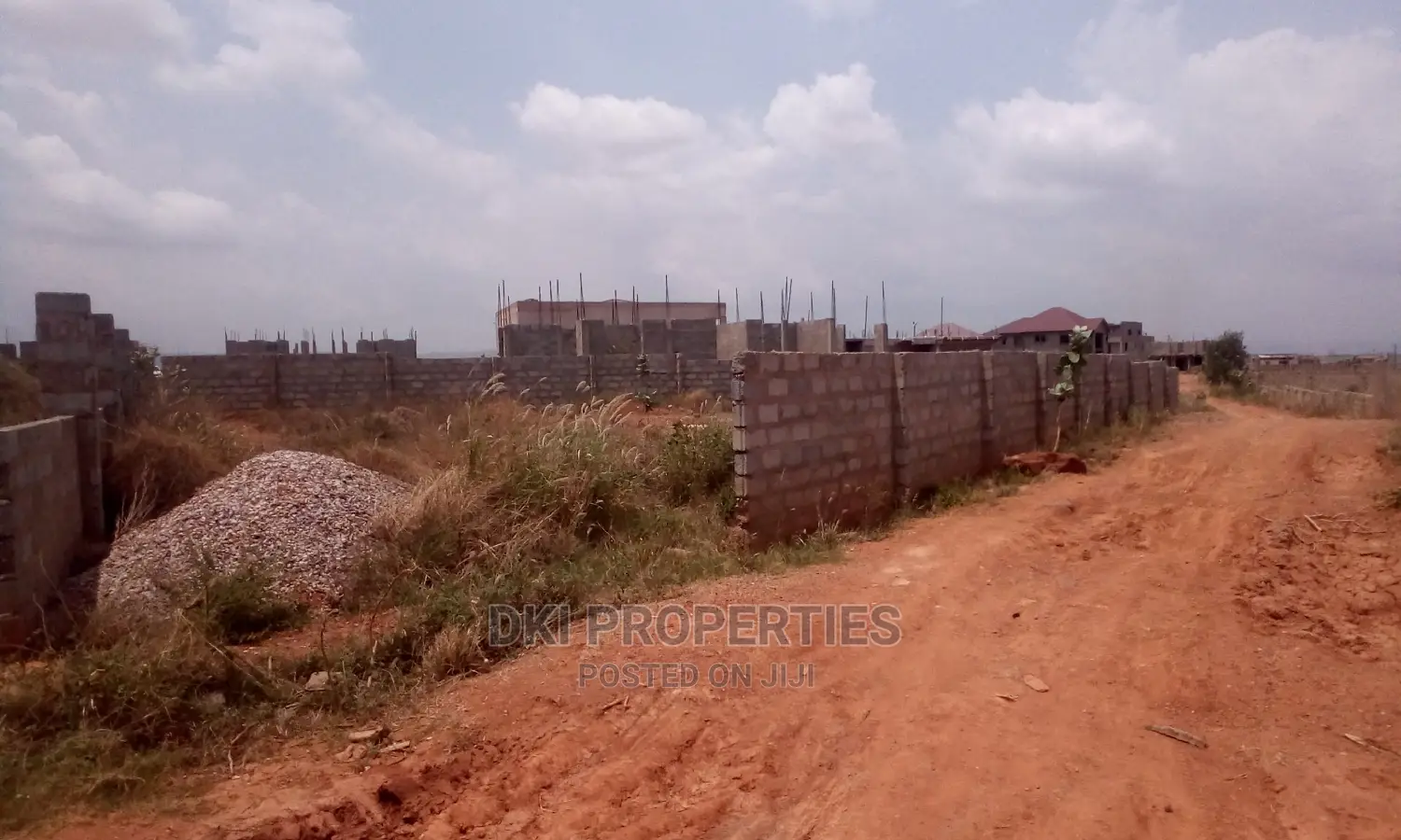 A Titled Plot of Land for Sale.