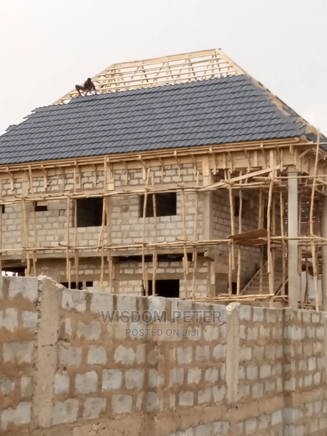 Romen Tille Roofing