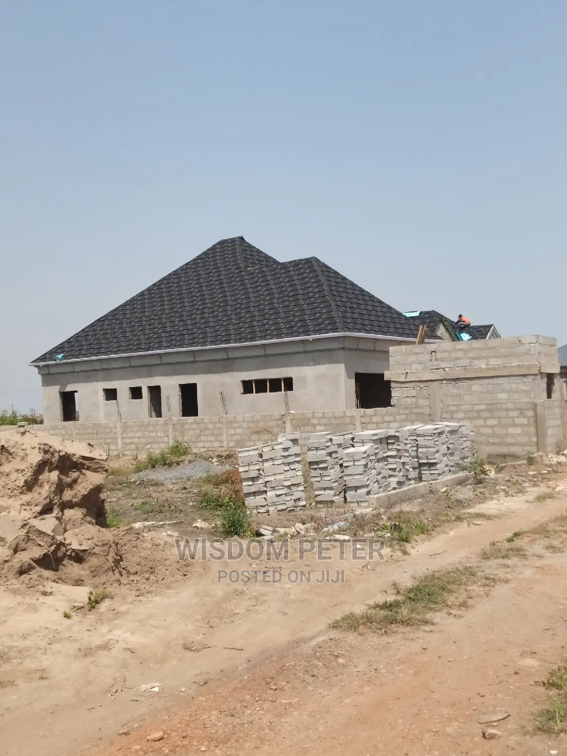 Romen Tille Roofing