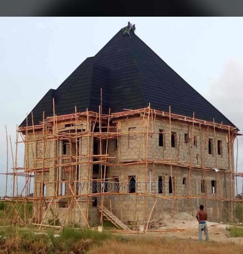 Roman Tille Roofing