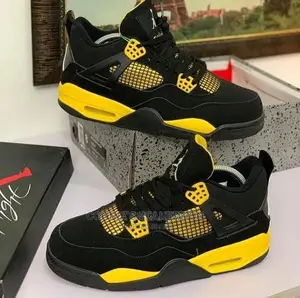 Photo - Air Jordan 4 Retro "Yellow/Red Thunder"