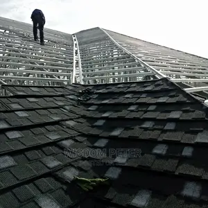 Roofing Stone Coated Tilles Done at Oyalifa Ghan Flag