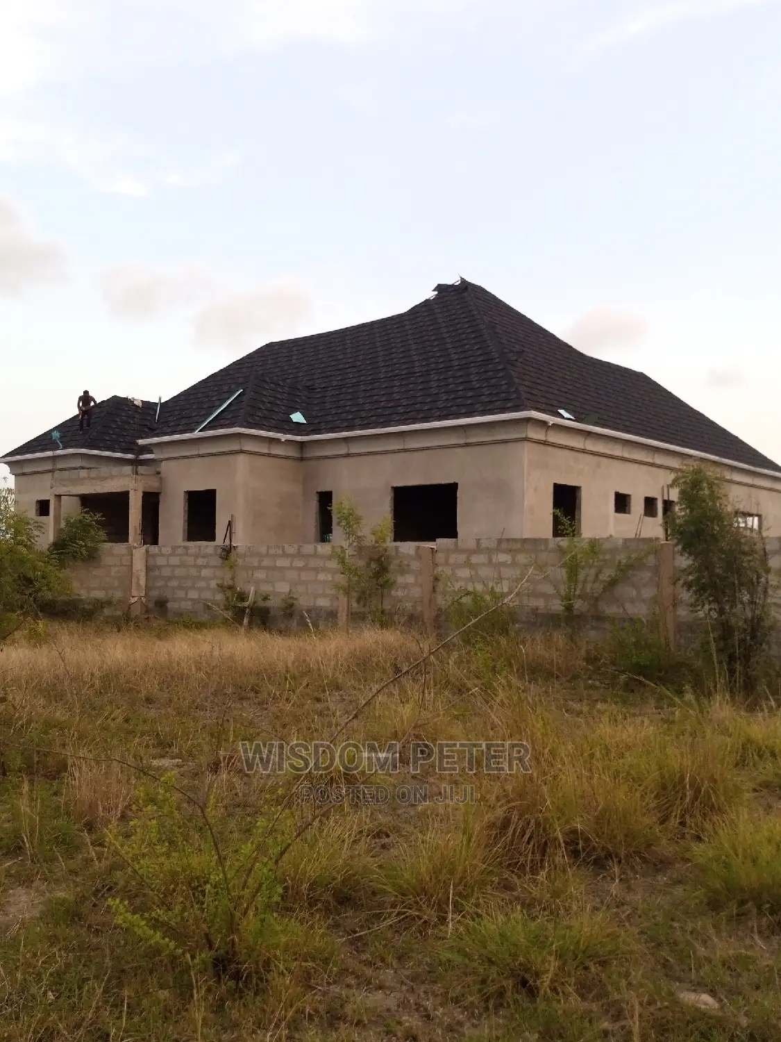 Roofing Stone Coated Tilles Done at Oyalifa Ghan Flag
