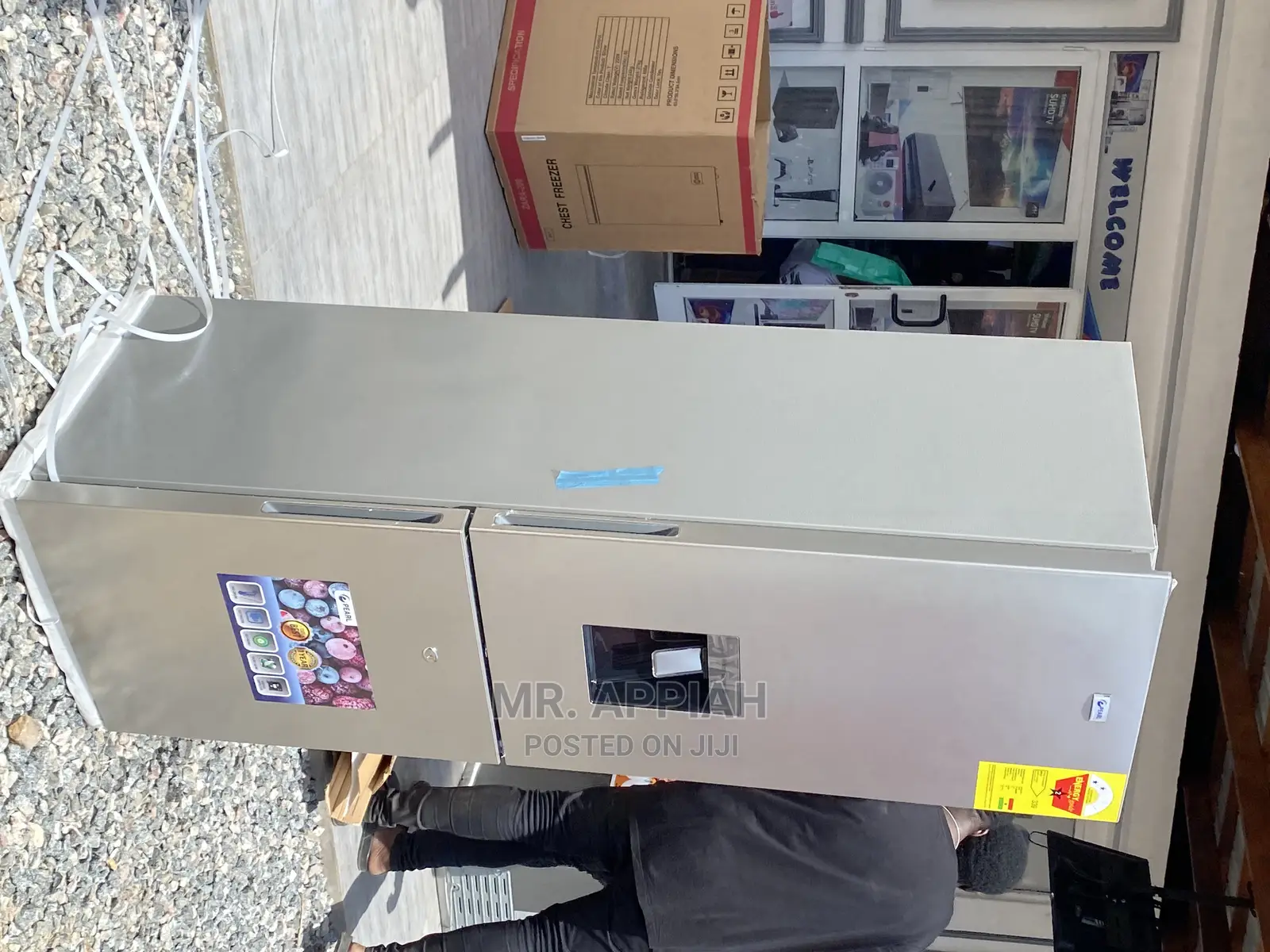 Extremely Chilling Pearl Top Freezer Fridge With Dispenser.