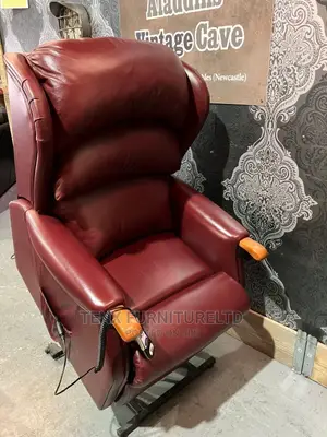 Immaculate Electric Rise Recline Chesterfield