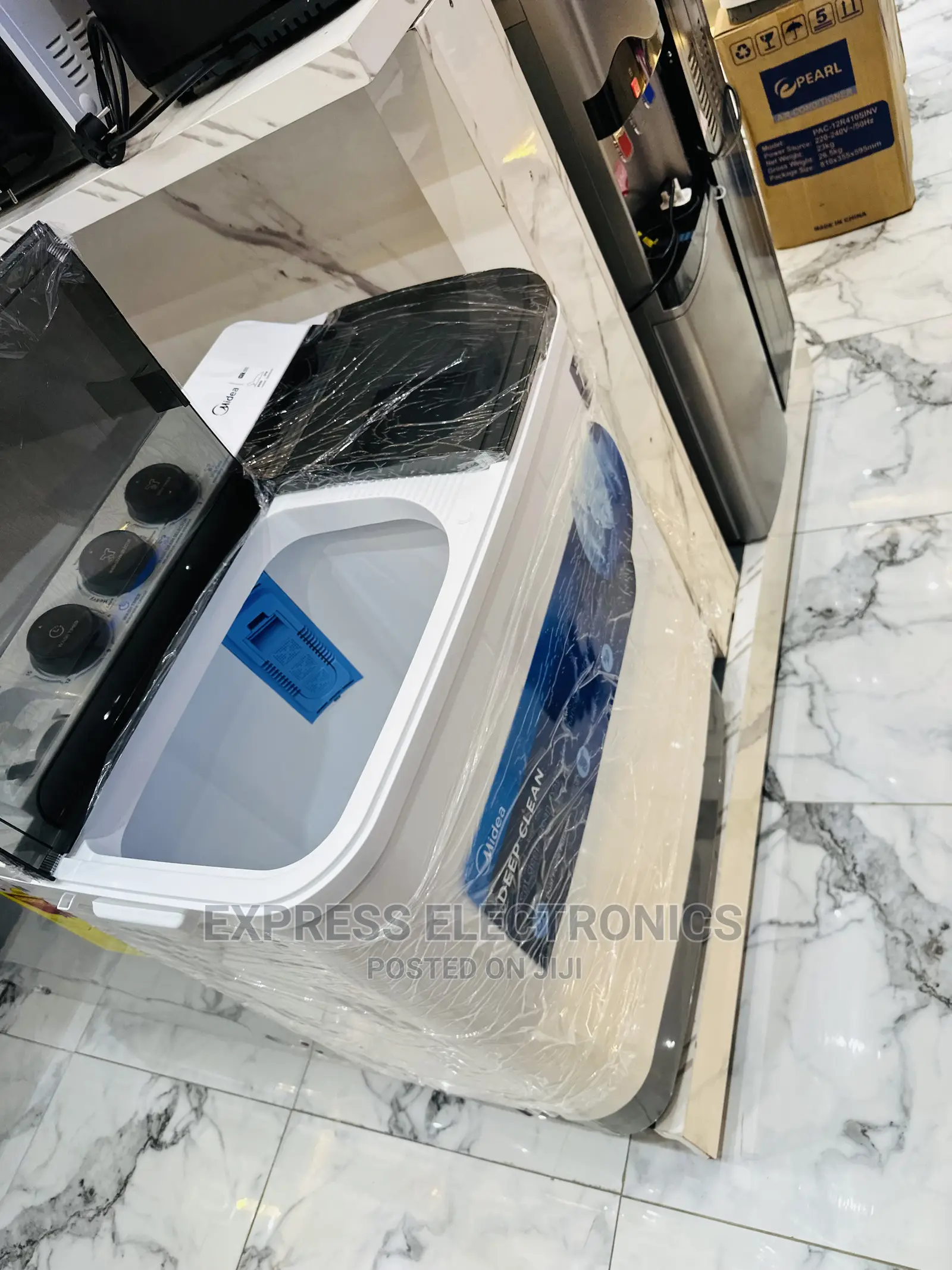 Available at Our Shop Midea 14kg Topload Washing Machine
