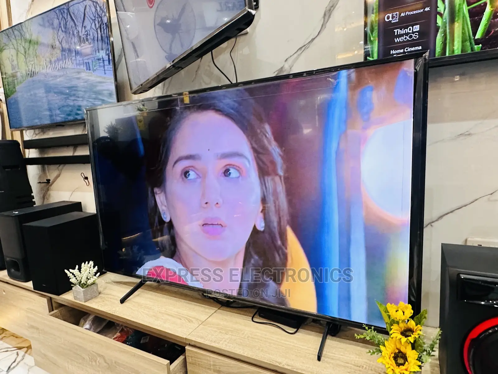 Call  or Text Us for Your 65X7500H UHD Smart Android
