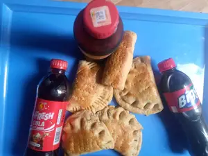 Tasty Meat Pie and Soft Drinks