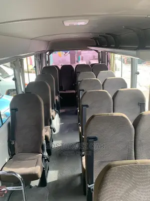 RENT a CAR- Coasters Bus With Refrigerator Luxury Bus Rental