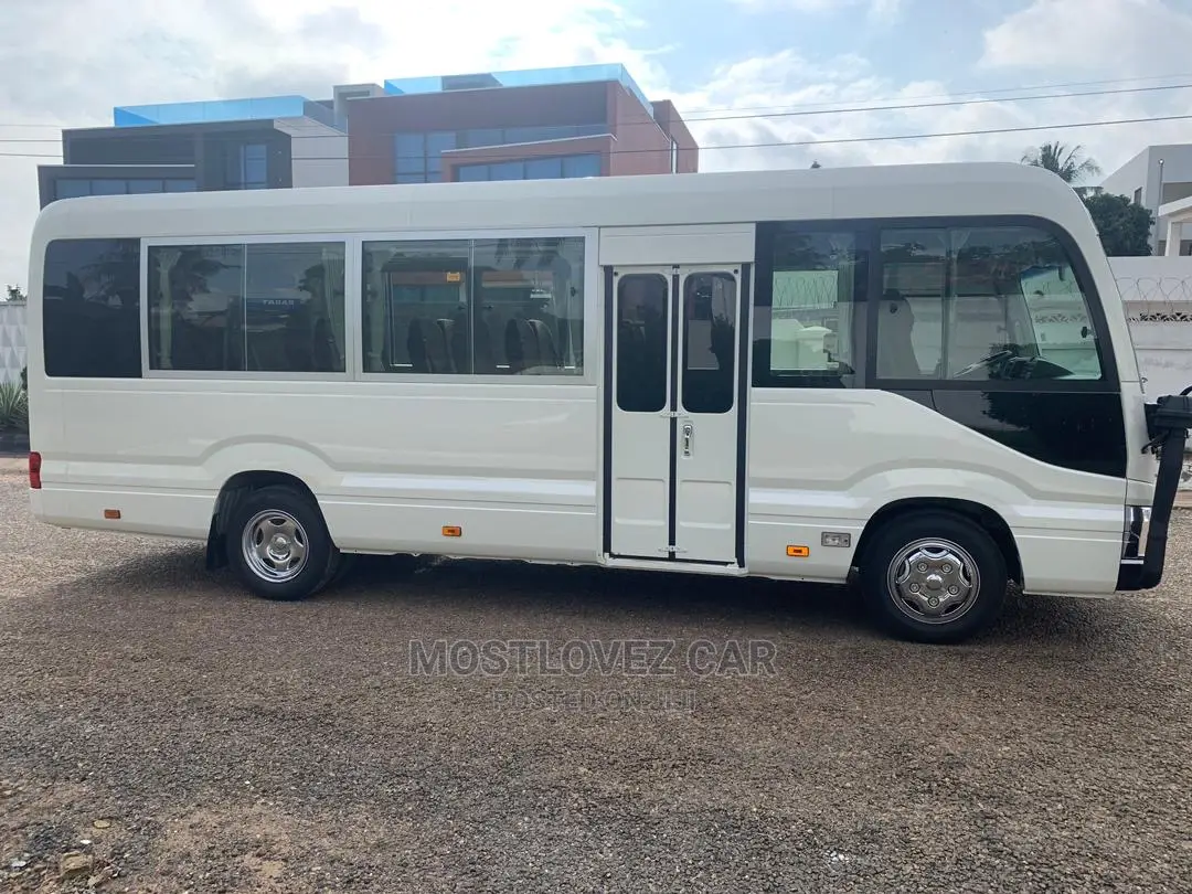 RENT a CAR- Coasters Bus With Refrigerator Luxury Bus Rental
