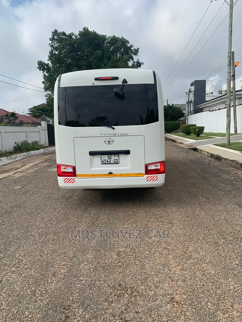 RENT a CAR- Coasters Bus With Refrigerator Luxury Bus Rental