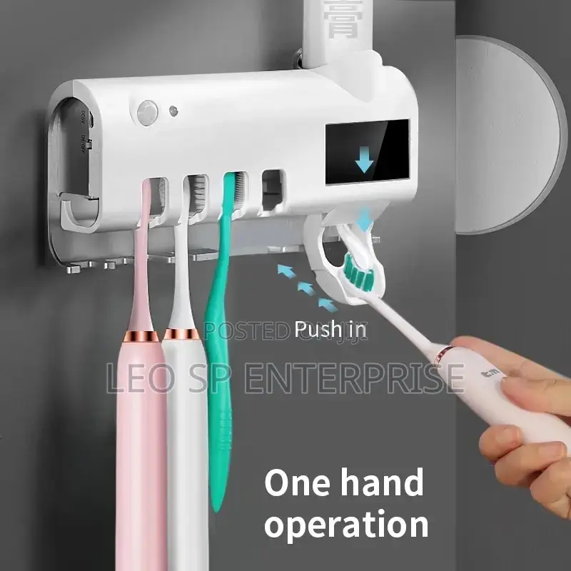 Toothbrush Holder and Automatic Dispense With Sterilizer
