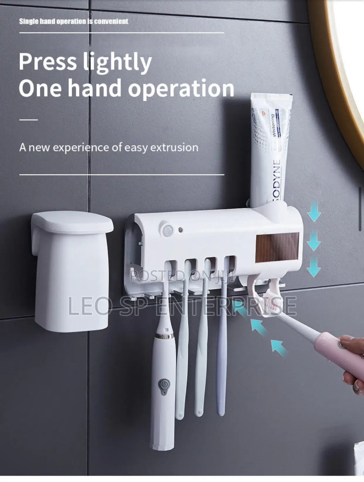 Toothbrush Holder and Automatic Dispense With Sterilizer