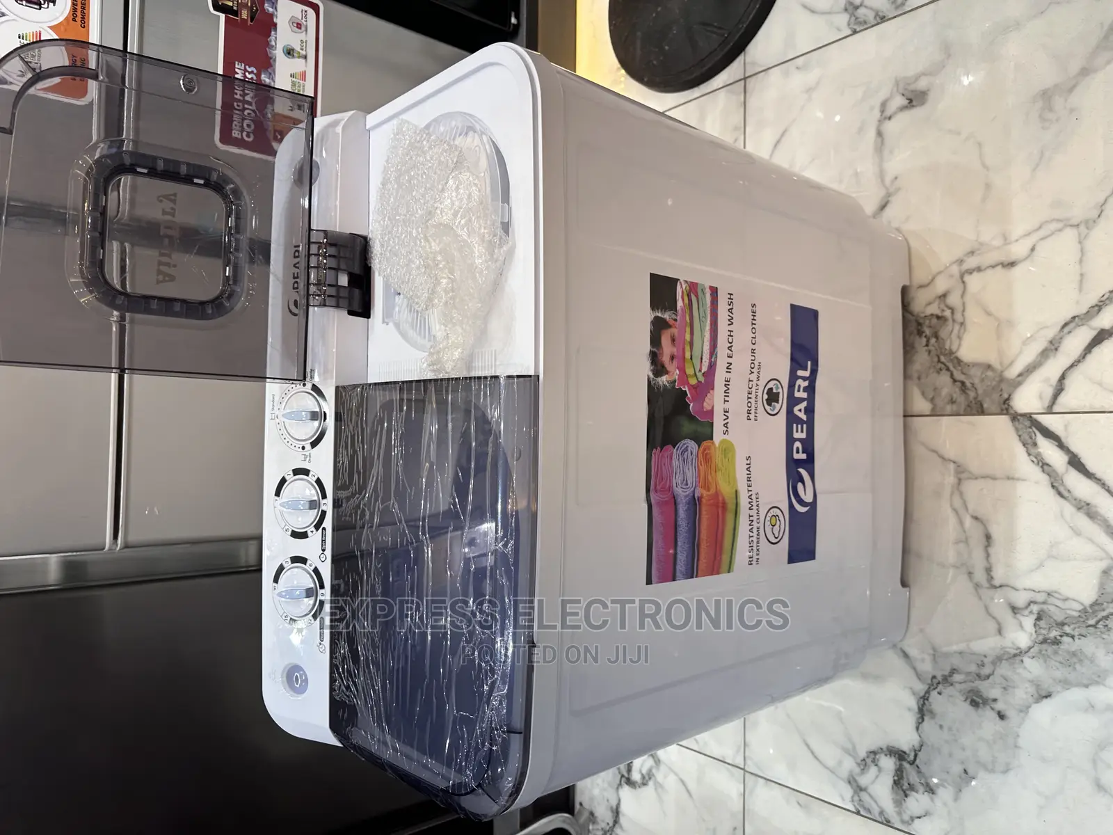 Stay Cool With 12kg Topload Twintub Pearl Washing Machine