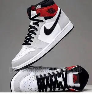 Photo - Classic Nike Air Jordan 1 Retro High Light Smoke Sneakers