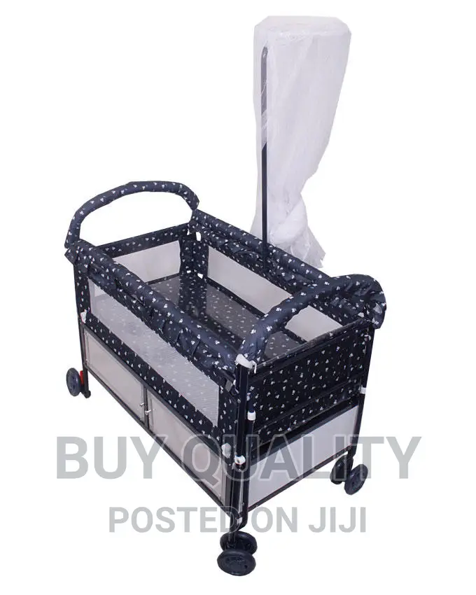 Baby's Cot With Mosquito Net