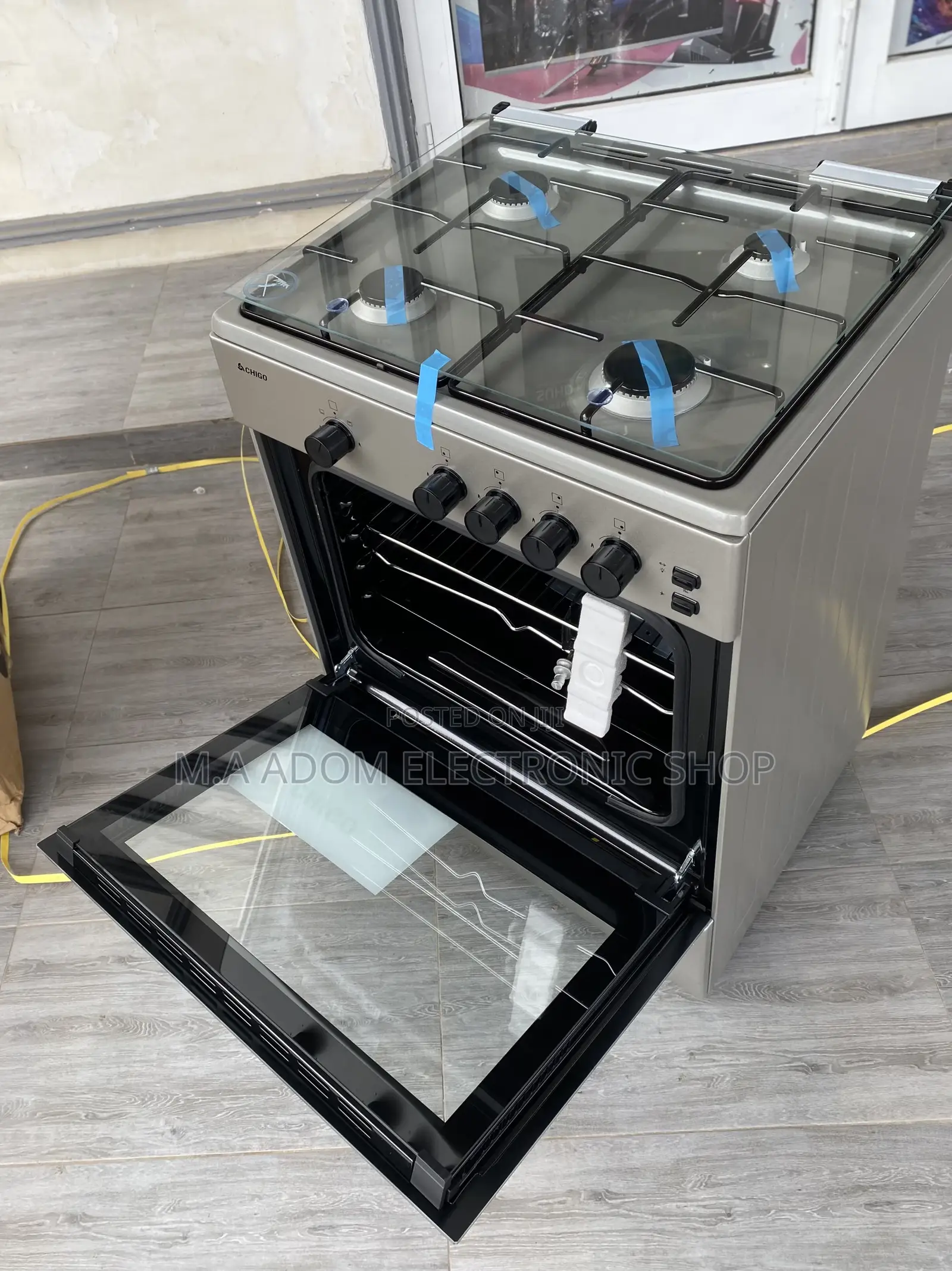 Brand New Chigo 60x60 4 Gas Burner With Oven and Grill.